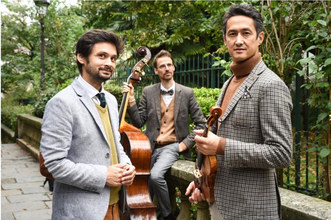 Les trois musiciens du trio Tromano, avec leurs instruments à vent